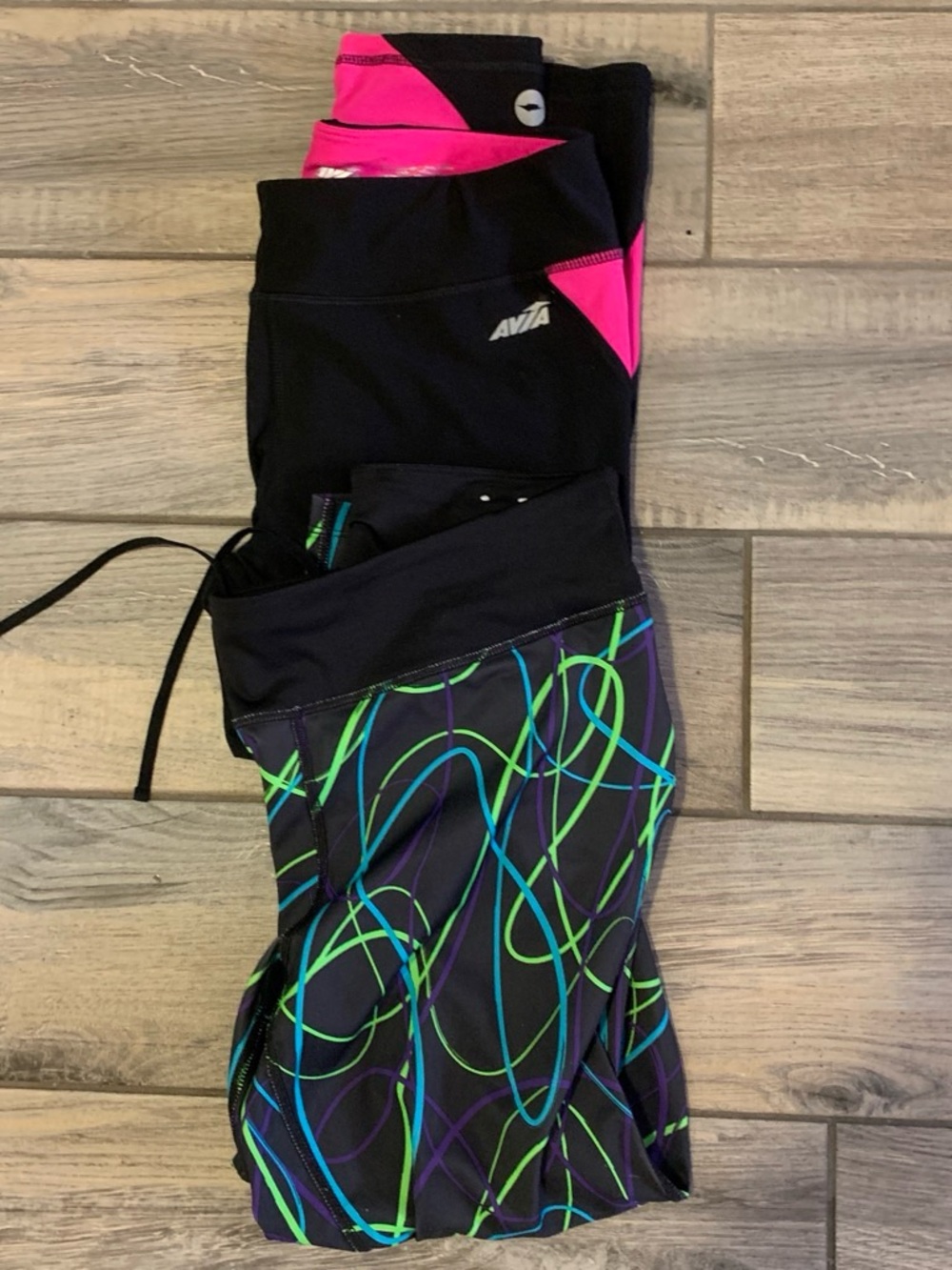Avia Black Leggings with Hot Pink Accents and Neon Swirl Panels